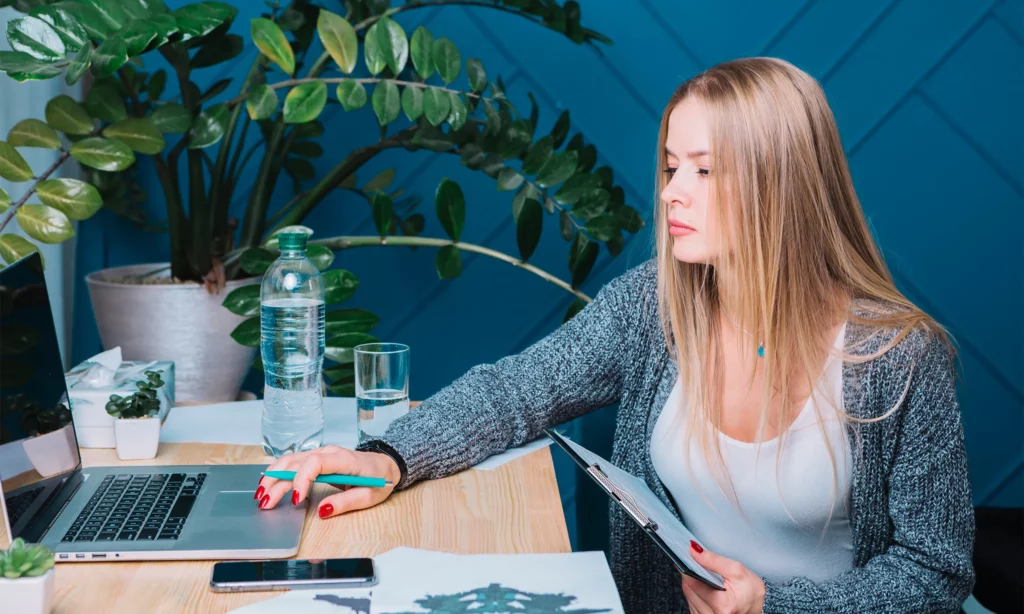 memorable financial planning services female financial advisor double checking her schedule